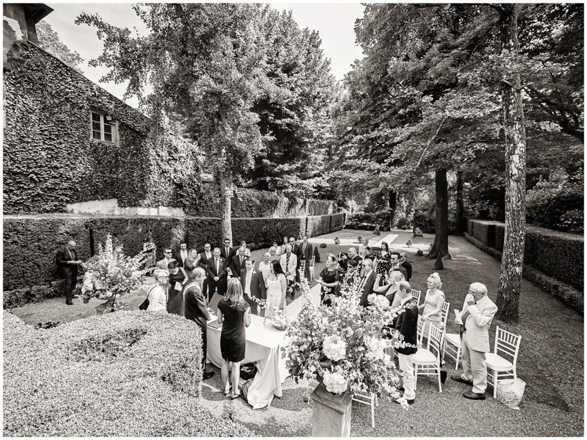 a ceremony in the garden of villa grabau